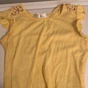 Yellow shirt with ruffles